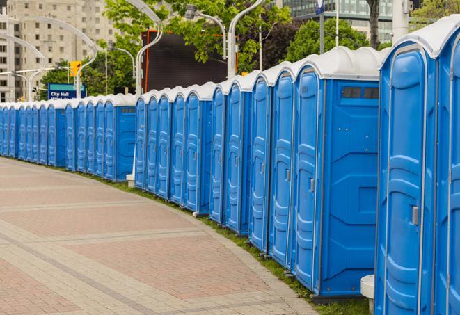 a row of portable restrooms set up for a special event, providing guests with a comfortable and sanitary option in Briny Breezes FL